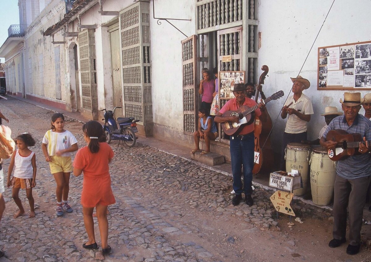 fantastic old men playing music in the streets of cuba