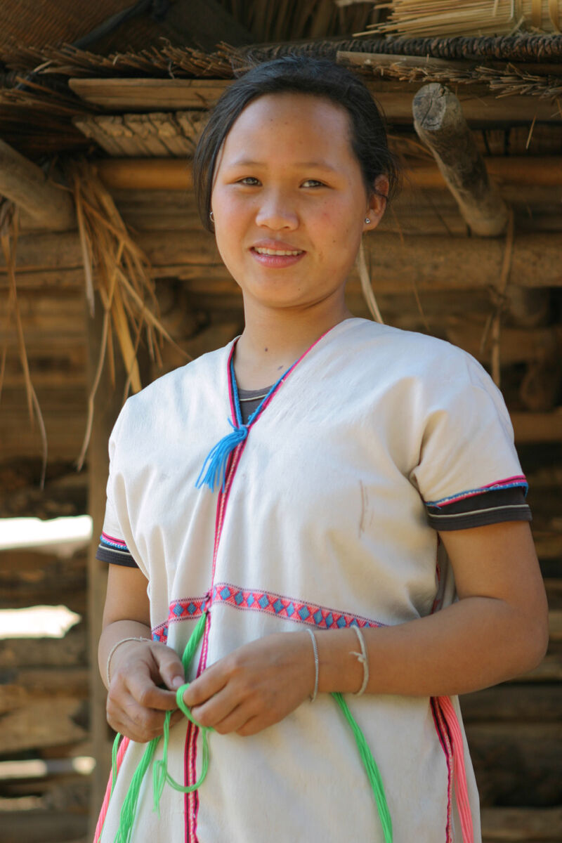 karen girl wearing traditional white dress